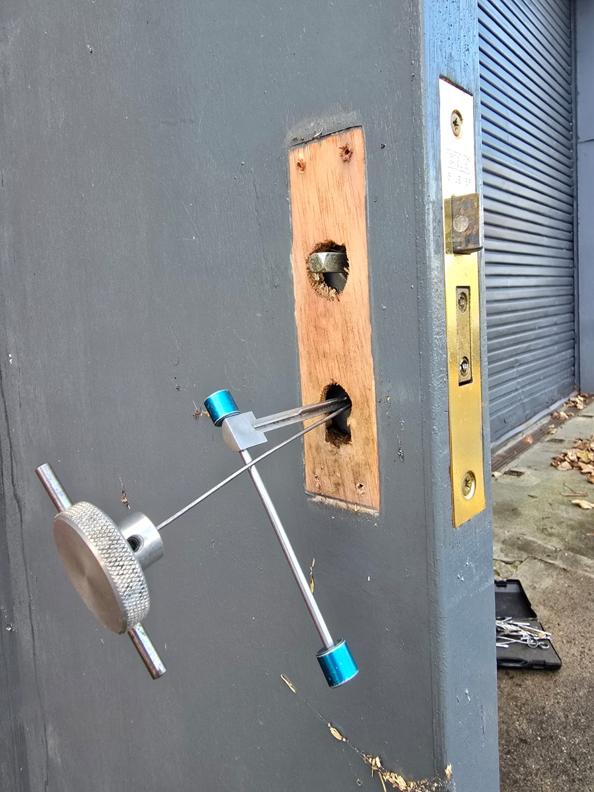 Lock fitting in progress with a specialist door jig